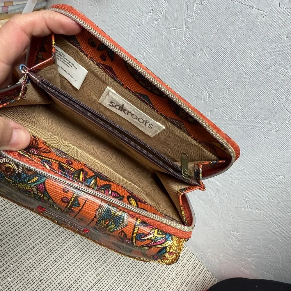 Sakroots Orange printed trifold large wallet like new bohemian coated canvas